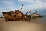 Africa;Mauritania;desierto_del_Sahara;el_Sahel;naturaleza_y_medioambiente;medioambiental;masas_agua;agua;mares_y_oceanos;mar;oceano_Atlantico;playa;transporte;medios_transporte;transporte_maritimo;navegacion;navegando;barco;barcos;barcos_pesca;abandonado;fuera_servicio;paisajes;puesta_Sol;atardecer;ocaso