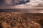 Europa;Portugal;Algarve;paisajes;puesta_Sol;atardecer;ocaso;paisaje_marino;acantilado;agua;mares_y_oceanos;mar;oceano_Atlantico;cielo;cielo_nublado;nubes