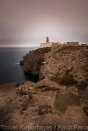 Europa;Portugal;Algarve;paisajes;puesta_Sol;atardecer;ocaso;paisaje_marino;acantilado;agua;mares_y_oceanos;mar;oceano_Atlantico;faros_en_costa;faro_marino;luz;iluminacion